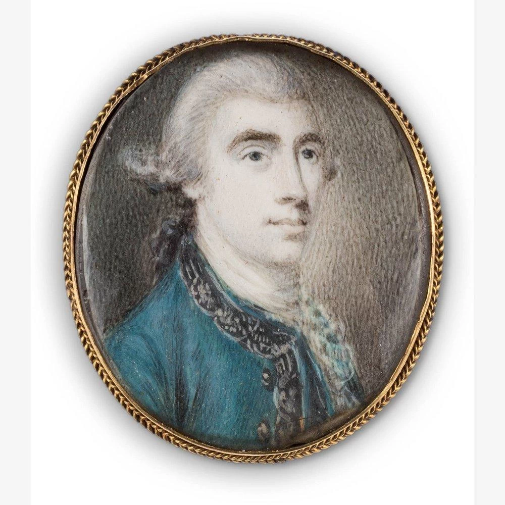Ritratto di un giovane gentiluomo in cappotto blu con bordo argento